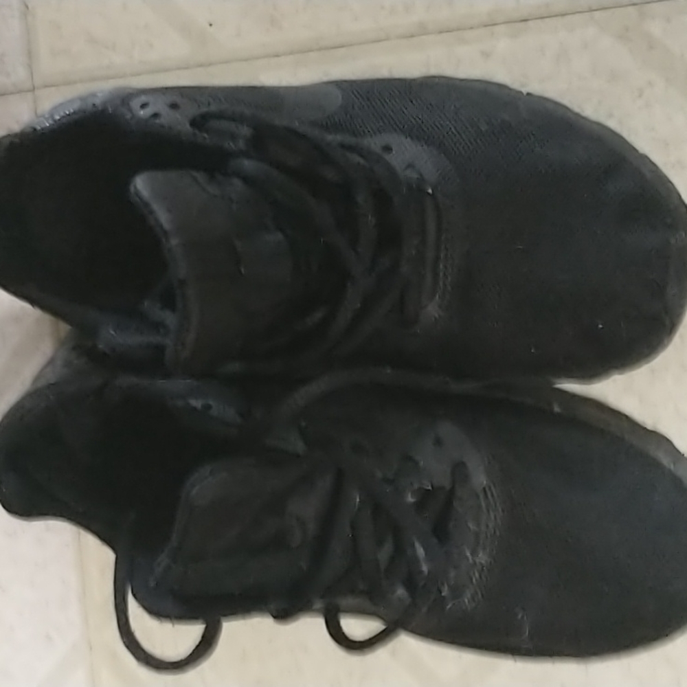 Black Nike running shoes